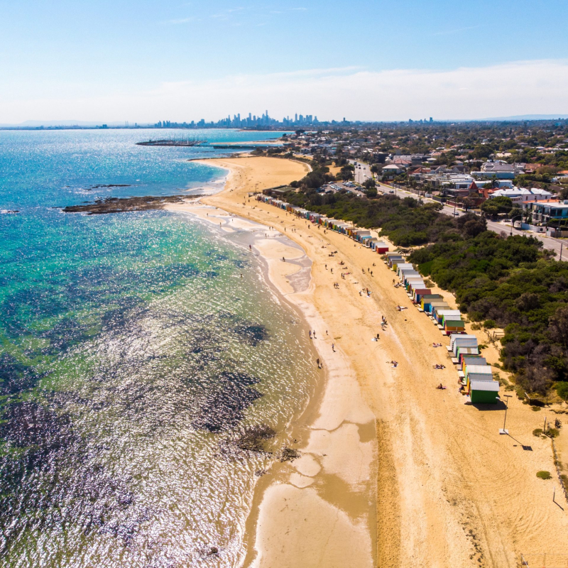 An aerial view of a beautiful beach with people